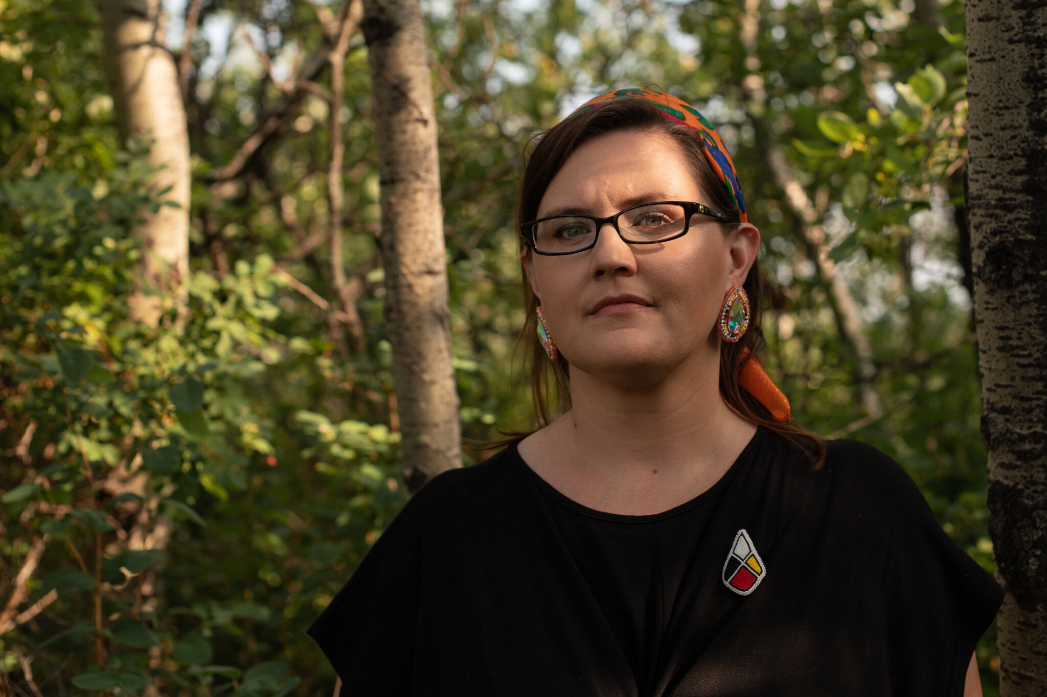 Professor Supernant’s beaded pin was created by a Métis artist. Amber Bracken for The New York Times