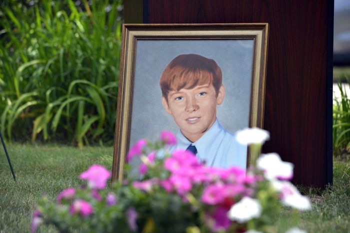 Graveside service for Danny Croteau The flowers on his grave frame a portrait of Danny Croteau during a graveside memorial service for the 13-year-old altar boy authorities determined was killed by his parish priest in 1972. (Don Treeger / The Republican) 6/28/2021