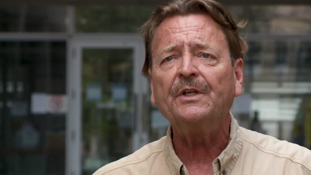 Survivor John Lousteau outside New Orleans' federal courthouse on Saturday, July 31, 2021. Photo by T.J. Pipitone, WWL-TV.