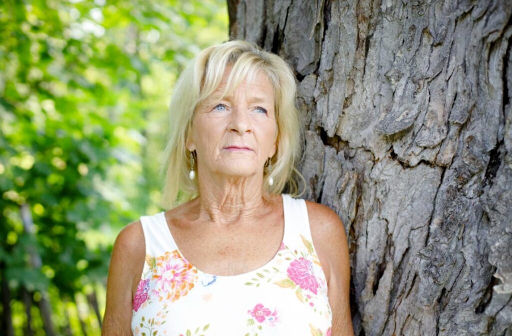 Sheri Biasin, 61, at her home in Cheshire.  Starting on the day of her first Communion, Biasin was subjected to a yearslong pattern of sexual abuse by the priest who delivered her Communion.  Stephanie Zollshan - Berkshire Eagle.