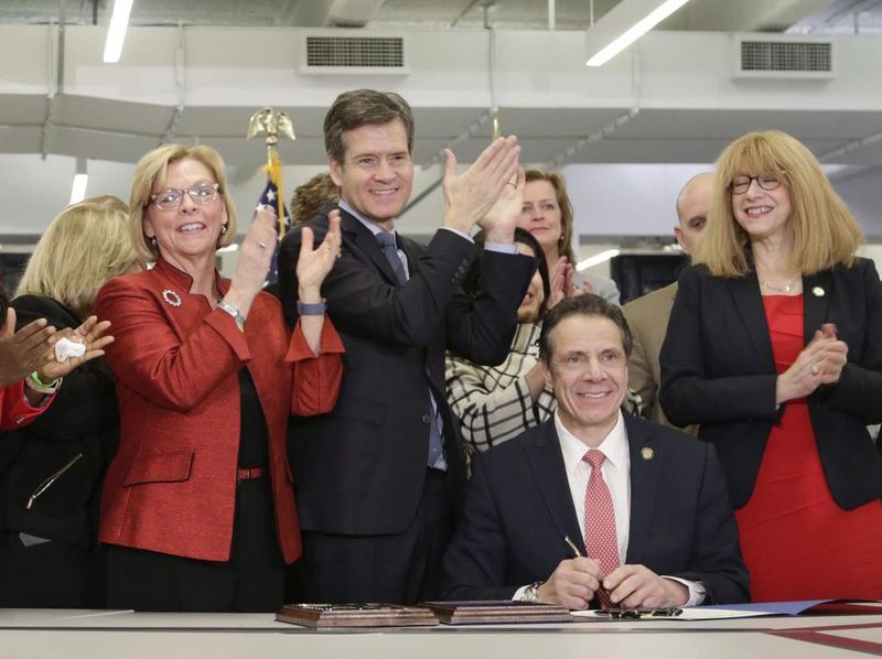 New York State Governor Andrew Cuomo is seen signing of the Child Victims Act in the offices of the NY Daily News in New York on February 14, 2019. (Mark Woodward/New York Daily News)]