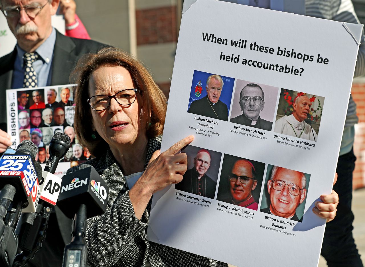 Anne Barrett Doyle, Co-Director of Bishop Accountability spoke on the Catholic abuse outside at Dedham District Court. David L. Ryan / Globe Staff