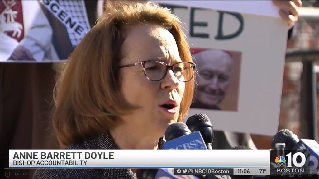 Anne Barrett Doyle, co-director of BishopAccountability.org, speaks at the organization's press conference after the arraignment.