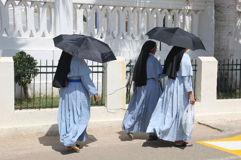 Indian nuns walk along the grounds of the Basilica of Our Lady of Good Health in Velankanni, Tamil Nadu. (Photo: AFP)