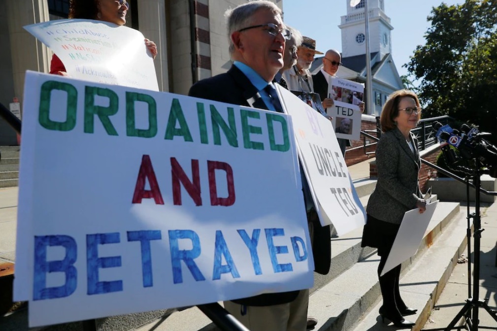 Anne Barrett Doyle, co-director of BishopAccountability.org, speaks to reporters in Dedham, Mass., on Sept. 3. (Brian Snyder / Reuters)