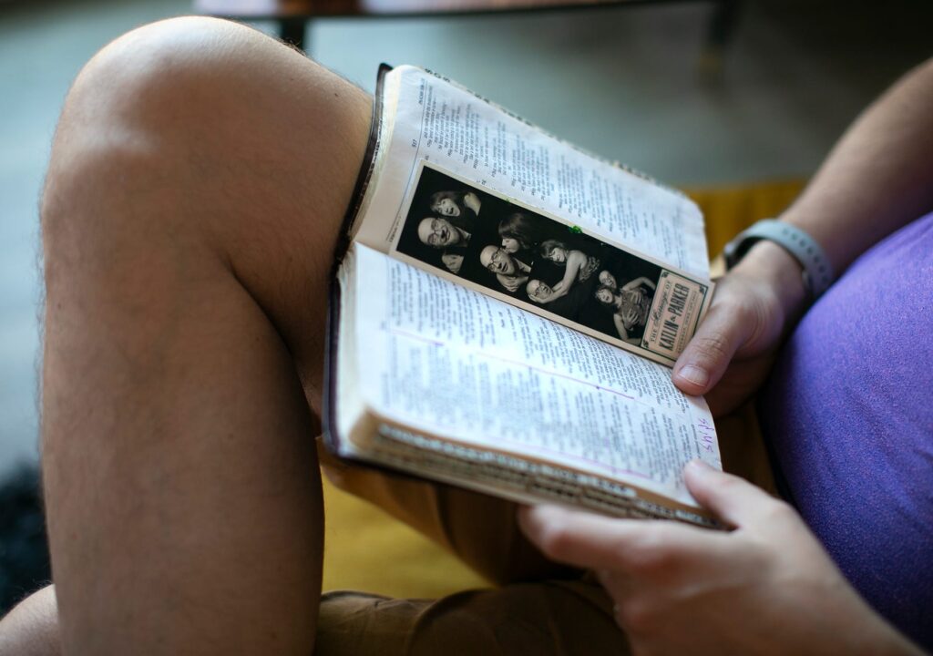 Chris Graham reads his Bible at home in Westerville. He said most of his relationship with God takes place outside of church now, when he's alone. Each morning, he takes some time with Jesus and meditates. COURTNEY HERGESHEIMER/COLUMBUS DISPATCH