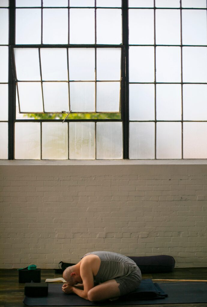 Chris Graham takes a yin yoga class at The Yoga and Fitness Factory. He says yoga has helped him deal with the trauma of being...COURTNEY HERGESHEIMER/COLUMBUS DISPATCH