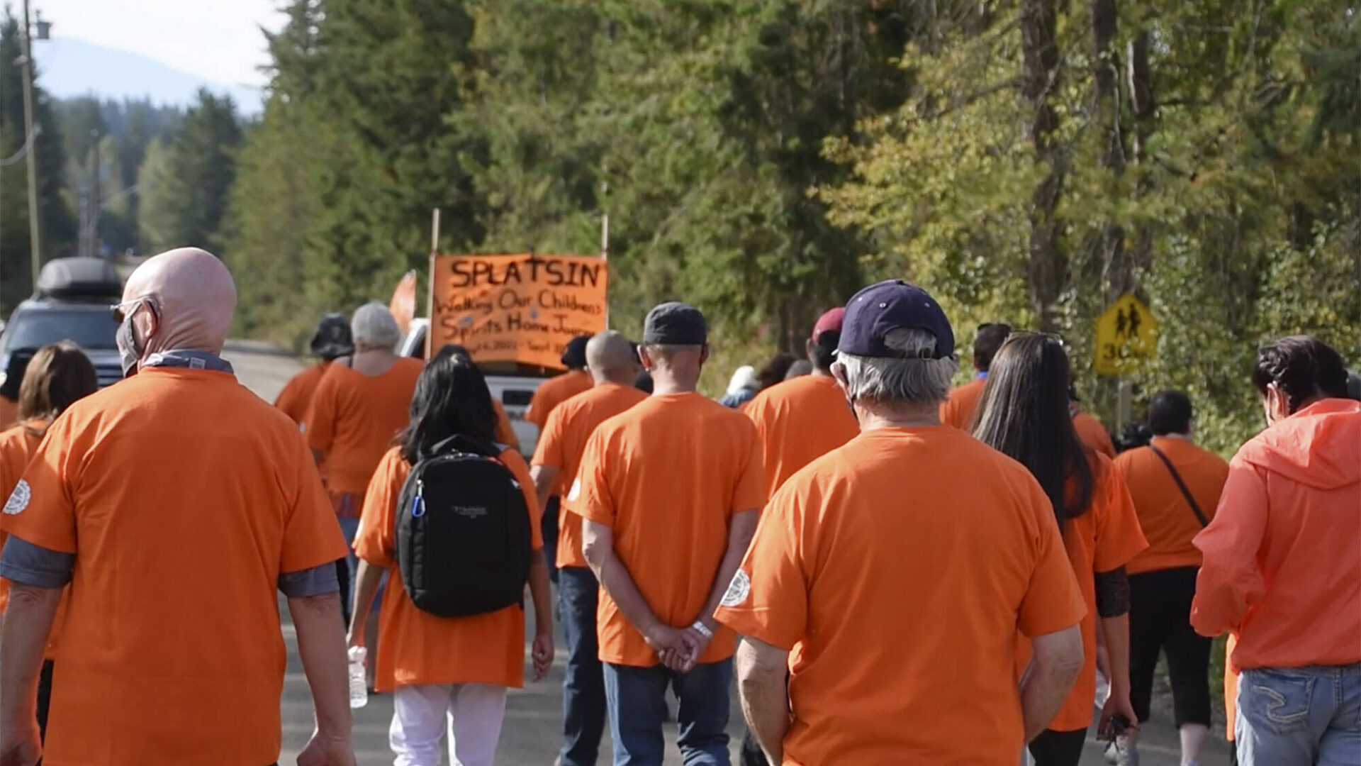 Splatsin members and their supporters walk on Sept. 10, 2021, the last day of the five-day Walking Our Children’s Spirits Home Journey from the Kamloops residential school. Here they were walking the spirits of the children who died in Kamloops to meet the spirits of children at Splatsin’s Shihiya School in order to join past, present and future. (Martha Wickett - Salmon Arm Observer)