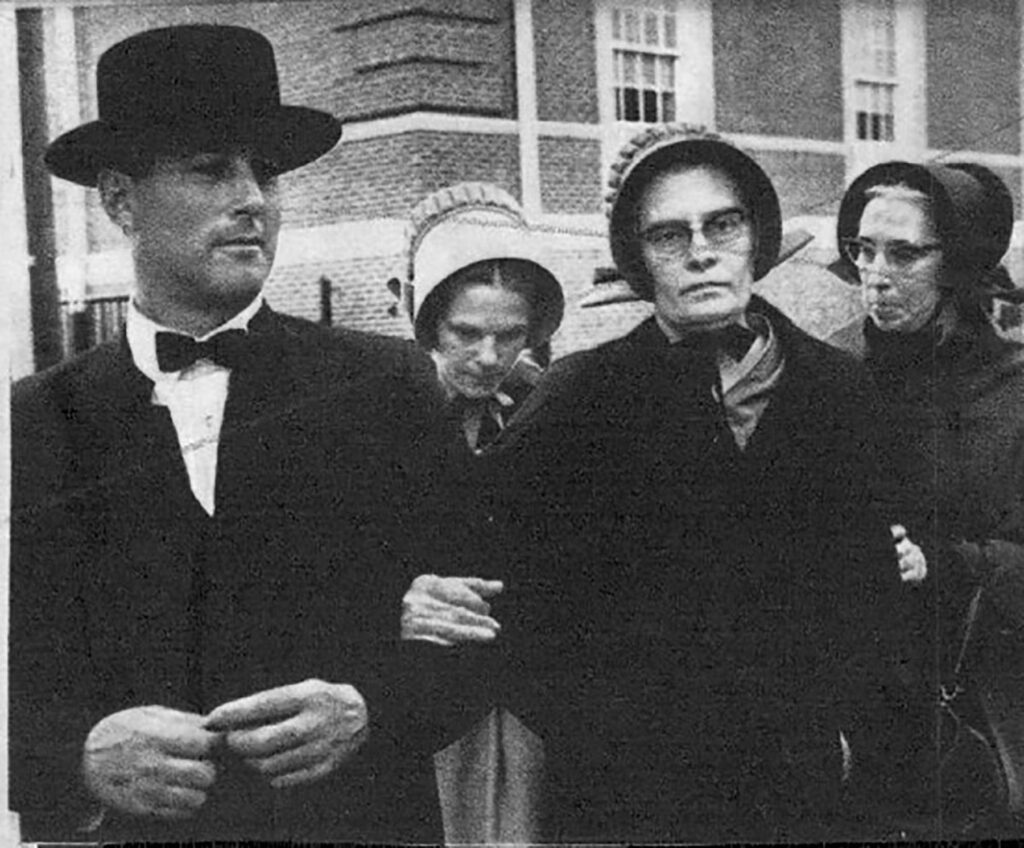 Patty Bear's mother, Gale Bear, pictured in the back with her head bowed, at the court appearance involving Gale's husband Robert Bear (not pictured). COURTESY OF PATTY BEAR