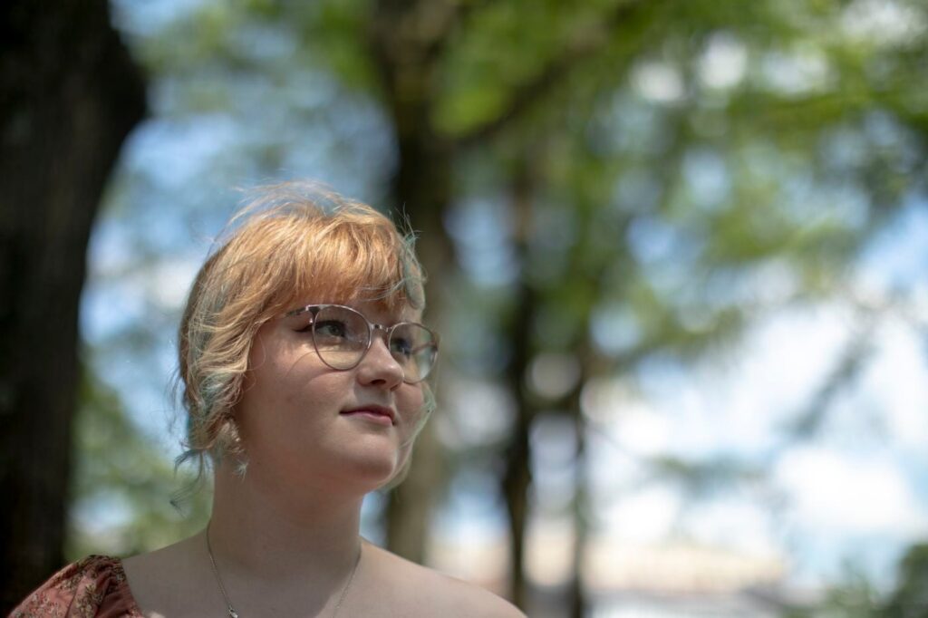 Maddie Rose Douglas poses on the University of Kentucky's campus in June. (Silas Walker)