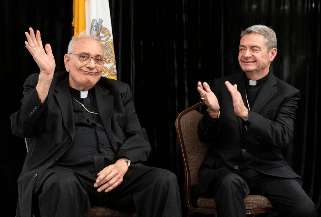 Bishop Brennan, right, declined to address the civil lawsuits against Bishop DiMarzio, left, who has been accused of sexually abusing two boys in the 1970s. John Minchillo / Associated Press
