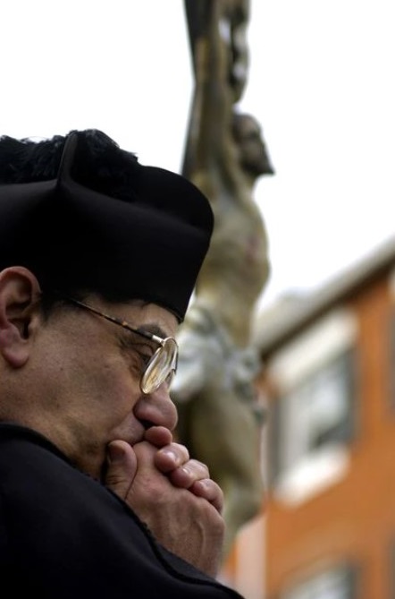 The Rev. Michael Salerno was removed as pastor at St. Leo the Great Roman Catholic Church in late 2007 because of an allegation that he had sexually abused a teenage boy at a church in Brooklyn, New York, more than 30 years earlier. He's pictured here in prayer in Little Italy in April 2007. (Karl Merton Ferron / Baltimore Sun)