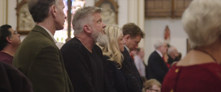 In “Procession,” Michael Sandridge (from left), Dan Laurine, Eileen Gavagan and her brother Ed Gavagan attend Mass in Cheyenne, Wyoming. Courtesy of Netflix
