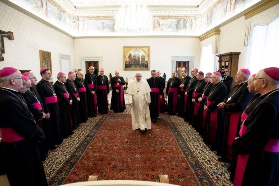 Pope Francis meets with Polish bishops at the Vatican Oct. 12 during their ad limina visit to Rome. In recent months 10 Polish bishops, mostly retired, have been disciplined for ignoring sex abuse complaints. (CNS / Vatican Media)