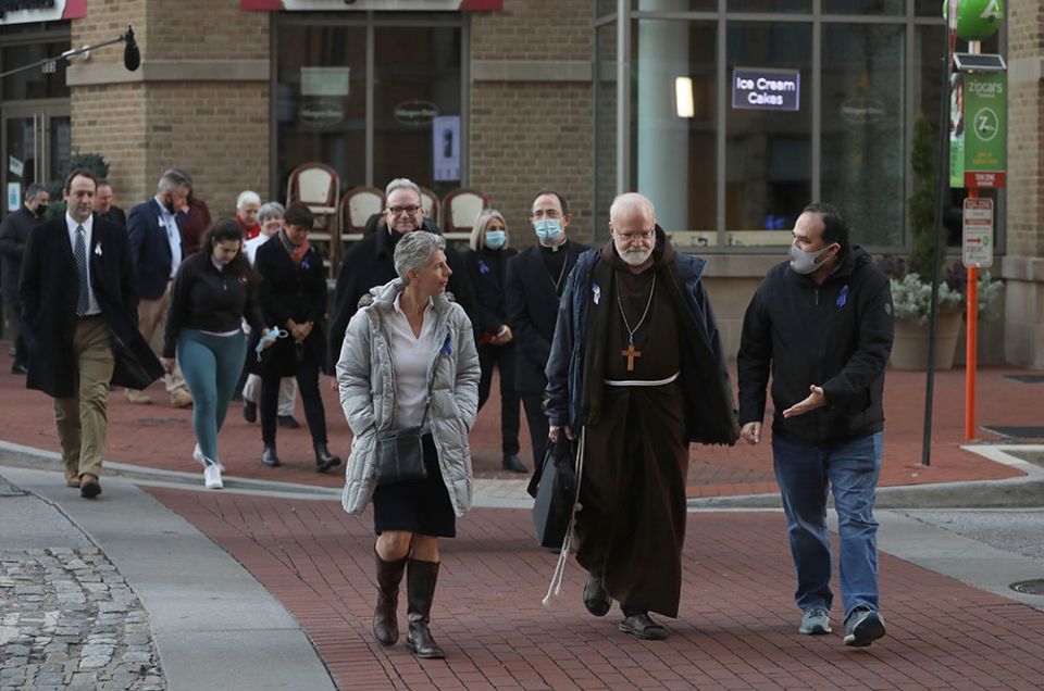 Cardinal Sean O'Malley of Boston, president of the Pontifical Commission for the Protection of Minors, joins a sunrise walk to end abuse Nov. 18, outside the hotel in Baltimore where the fall general assembly of the U.S. Conference of Catholic Bishops was being held Nov. 15-18. (CNS/Bob Roller)