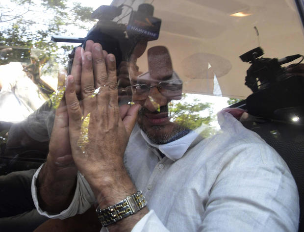 Roman Catholic Bishop Franco Mulakkal greets the media as he leaves a court in Kottayam, India, January 14, 2022, after being acquitted of charges of raping a nun in her rural convent.