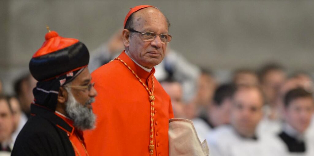 Cardinal Baselios Cleemis (L) and Cardinal Oswald Gracias arrive in St Peter's Basilica in Rome ahead of a papal election conclave on March 12, 2013. | Gabriel Bouys / AFP