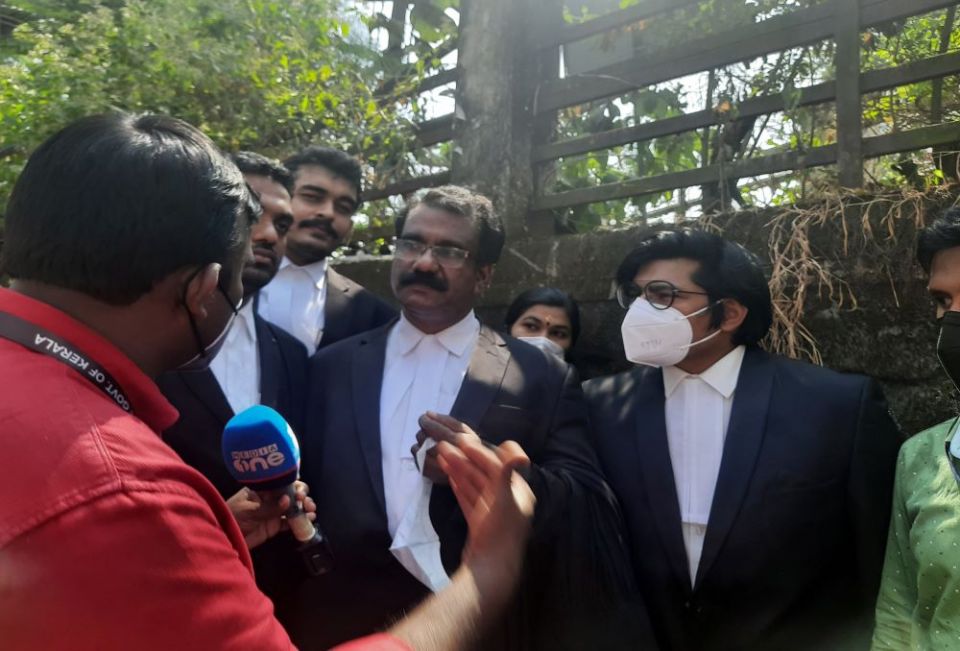 C. S. Ajay, center, a member of the legal defense team of Bishop Franco Mulakkal of Jalandhar, talks to reporters Jan. 14, 2022, about the acquittal of the prelate in the historic nun rape case by a trial court in Kottayam, Kerala. (Saji Thomas