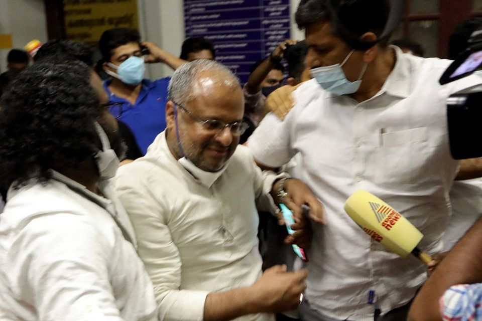 Bishop Franco Mulakkal, flanked by relatives, including, at right, his brother-in-law P.P. Chacko, goes to his car parked inside the compound of the Additional District and Sessions Court in Kottayam, Kerala, India, where he was acquitted on Jan. 14 of charges of raping a nun. (M.A. Salim)