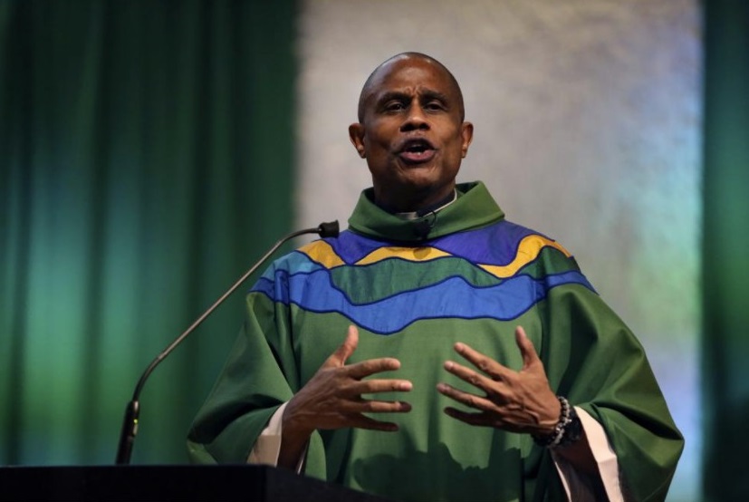 The Rev. Bryan Massingale gives a sermon on Sunday, Jan. 30, 2022, at St. Charles Borromeo Catholic Church in the Harlem neighborhood of New York. Massingale came to terms with his sexuality as a gay man at 22 and became public about it in 2019. (AP Photo / Jessie Wardarski)