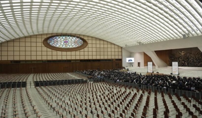 Faithful gather in the Paul VI hall to attend the opening of a 3-day Symposium on Vocations in the Paul VI hall at the Vatican, Thursday, Feb. 17, 2022. (AP Photo / Gregorio Borgia)
