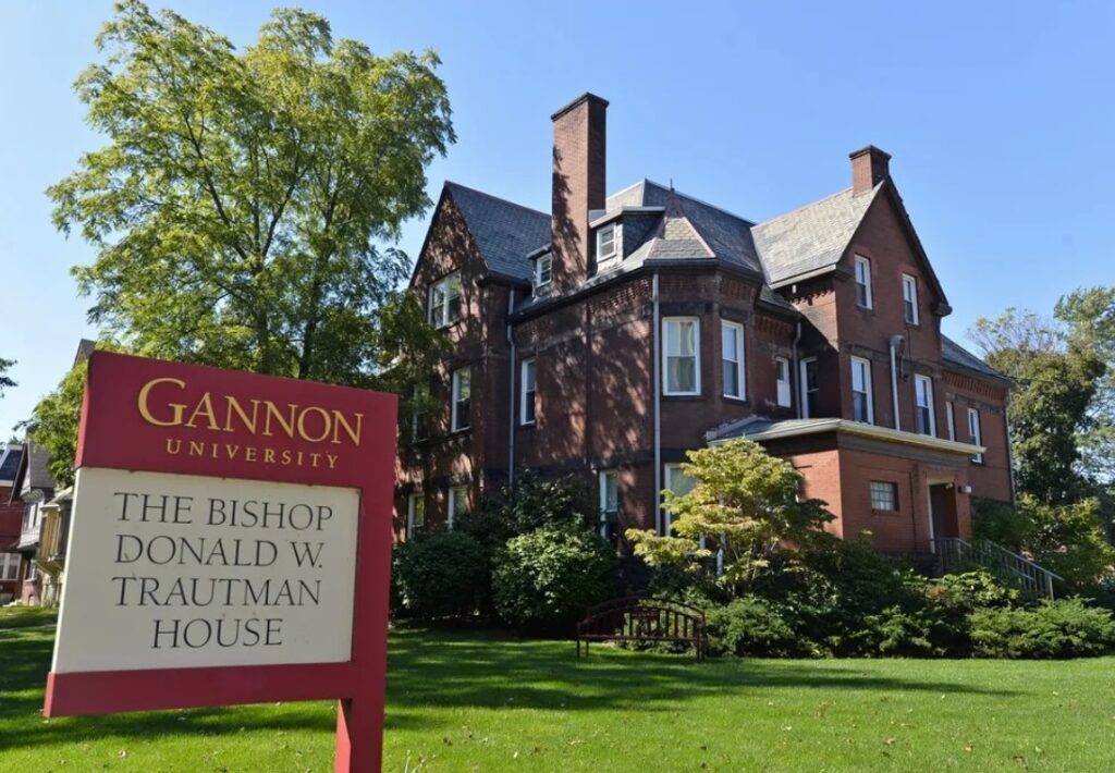 Gannon University in November 2012 named one of its buildings, 306 W. 6th St. in Erie, the Trautman House, after Erie Catholic Bishop Donald W. Trautman, who retired in October 2012 and had been the chairman of the board at Gannon, a Roman Catholic institution. The Gannon board in September 2018 renamed the building the Catholic House in response to the August 2018 statewide grand jury report over the clergy abuse crisis in the Catholic Church. The report criticized Trautman's handling of an abuse case as bishop. Christopher Millette, File Photo, Erie Times-News