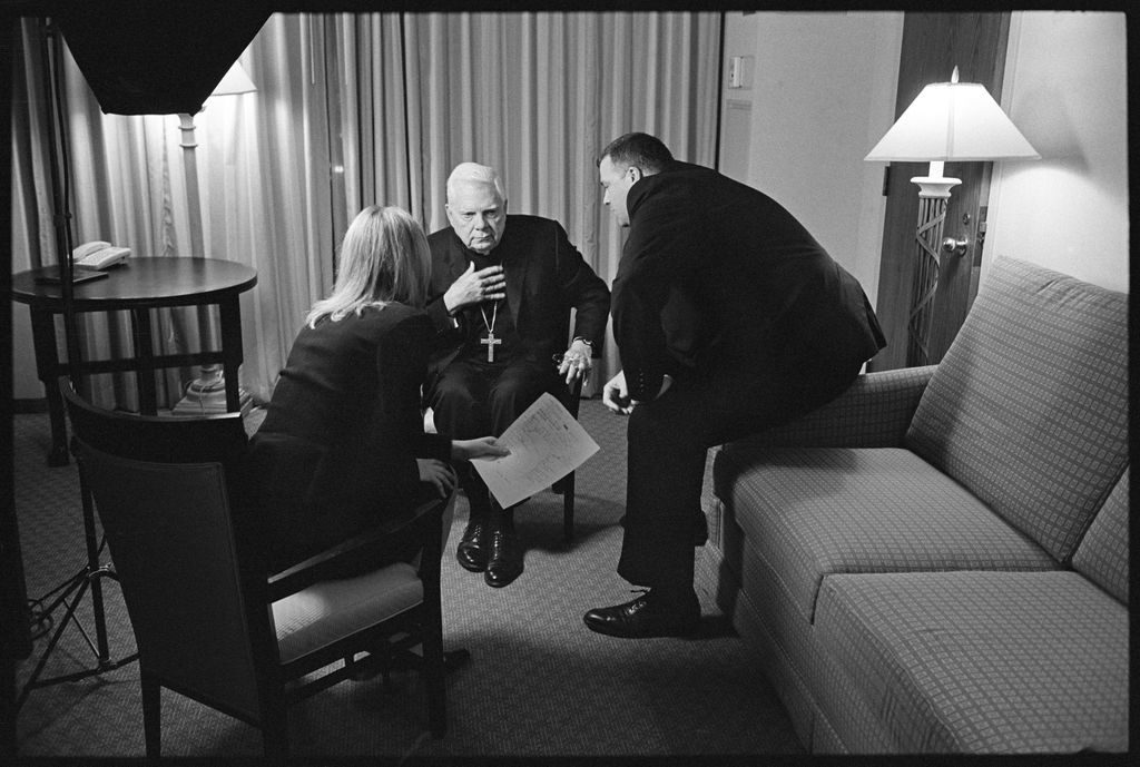 Lisa Kessler, "Advisors" (2002). Cardinal Bernard Law prepares for interviews with members of the Boston press during the Bishops' Conference in Washington, D.C., Nov. 13, 2002. ©LISA KESSLER, COURTESY HOWARD YEZERSKI GALLERY