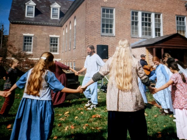 Twelve Tribes members dance together in Vermont at a public event in hopes of attracting new members to the group in 1997. 
