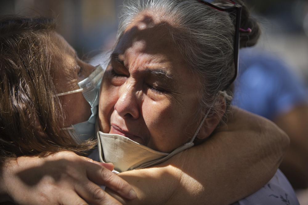 People react outside the court after Argentine Bishop Gustavo Zanchetta was convicted and sentenced to 4 1/2 years in prison for continued sexual abuse of two former seminarians in Oran, Argentina, Friday, March 4, 2022. (AP Photo/Javier Corbalan) 2 of 3 People react outside the court after Argentine Bishop Gustavo Zanchetta was convicted and sentenced to 4 1/2 years in prison for continued sexual abuse of two former seminarians in Oran, Argentina, Friday, March 4, 2022. (AP Photo/Javier Corbalan)