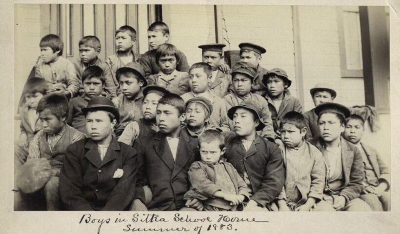 This photo made available by the Presbyterian Historical Society, Philadelphia shows students at a Presbyterian boarding school in Sitka, Alaska in the summer of 1883. U.S. Catholic and Protestant denominations operated more than 150 boarding schools between the 19th and 20th centuries. Native American and Alaskan Native children were regularly severed from their tribal families, customs, language and religion and brought to the schools in a push to assimilate and Christianize them. (Presbyterian Historical Society, Philadelphia via AP, File)