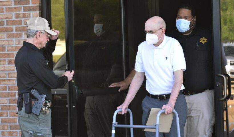 Paul West, center, is escorted by deputies from the Leflore County Civic Center in Greenwood, Miss., on Wednesday, April 13, 2022, after a jury found him guilty of sexually abusing a student at St. Francis of Assisi School in the 1990s. West, a former Franciscan friar, worked as a teacher and then principal at the Catholic school in Greenwood. Circuit Judge Ashley Hines sentenced West to 30 years on the first count and 15 years on the second. (Tim Kalich / The Commonwealth via AP)