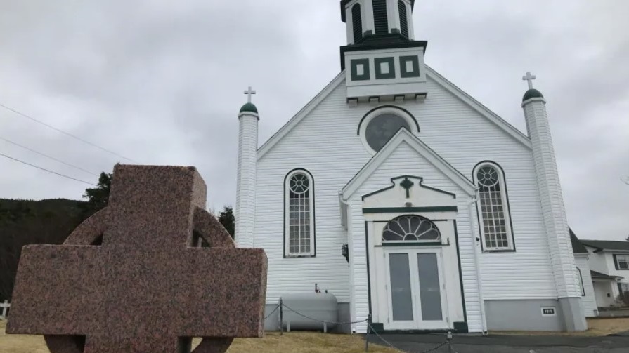 Like all properties owned by the Roman Catholic Archdiocese of St. John's, Holy Rosary parish in Portugal Cove-St. Philip's is being sold to pay compensation to victims of abuse at the former Mount Cashel orphanage. The church has been a place of worship for more than a century but is also closely linked to disgraced priest James Hickey, who was convicted of abusing young boys over a 17-year period in the 1970s and '80s. (Terry Roberts / CBC)