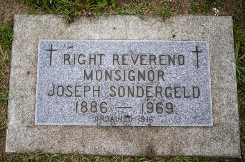 The grave of the Rev. Joseph Sondergeld is pictured Saturday, April 30, 2022 at Calvary Cemetery in Yakima, Wash. Sondergeld is among 22 priests and deacons whose accusations of abuse have been substantiated by the Yakima Catholic Diocese. Evan Abell / Yakima Herald-Republic