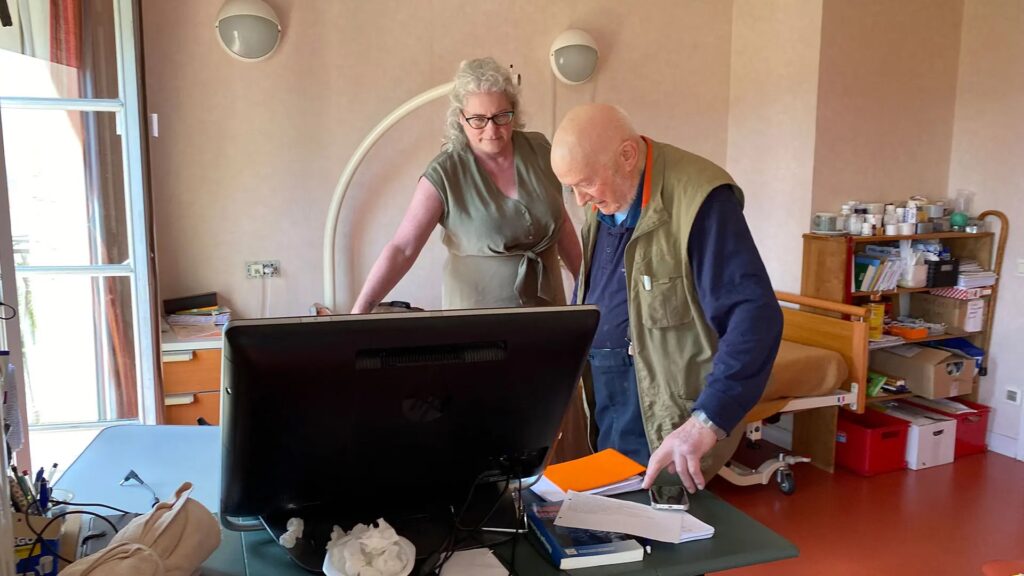 Oblate priest Joannes Rivoire with APTN News reporter Kathleen Martens in Lyon, France. Photo: Agustin Lucardi for APTN