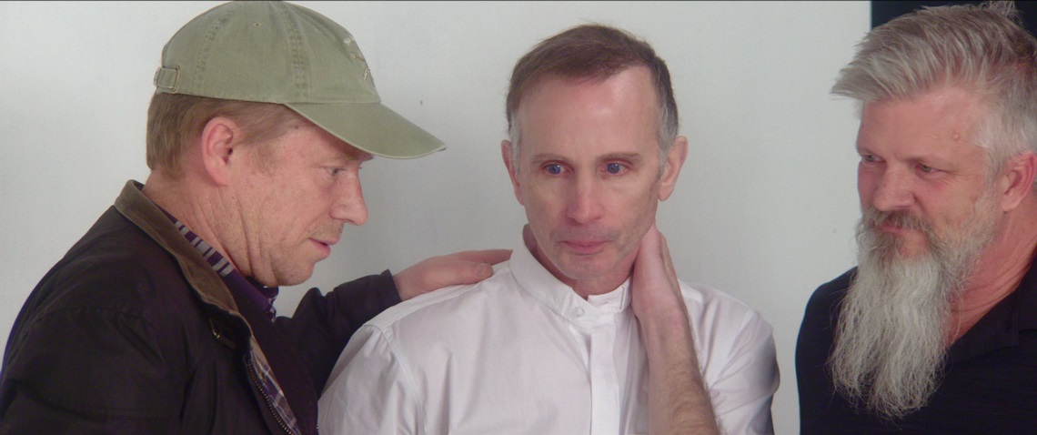 Ed Gavagan, Michael Sandridge and Dan Laurine in a scene from Procession, a documentary that follows six men, all survivors of childhood sexual abuse by Catholic priests and clergy, who come together to direct a drama therapy-inspired experiment designed to collectively work through their trauma - Courtesy of Netflix