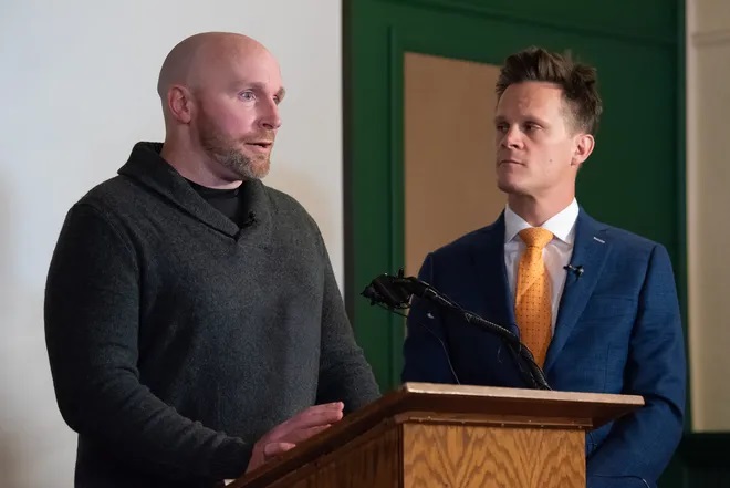 Scott Verti, left, stands with Kurt Zaner, one of his attorneys, as he takes questions at a press conference announcing the filing of a civil lawsuit against the Archdiocese of Denver, St. Elizabeth Ann Seton Catholic Parish, and Timothy Evans, a former priest Verti said sexually abused him more than 100 times as a teen, Thursday in Denver.