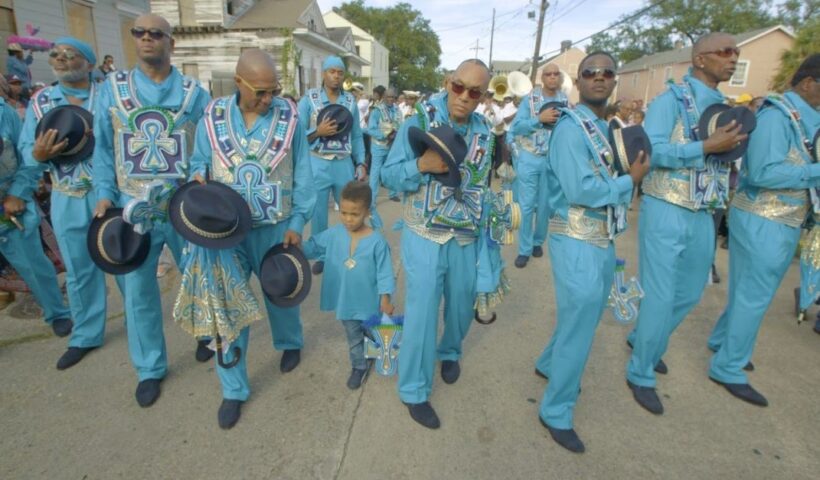 Film still of Black Men of Labor marching and singing "Amazing Grace" during their annual second line parade in a scene from Jason Berry's film "City of a Million Dreams." CITY OF A MILLION DREAMS/SPIRIT TIDE PRODUCTIONS