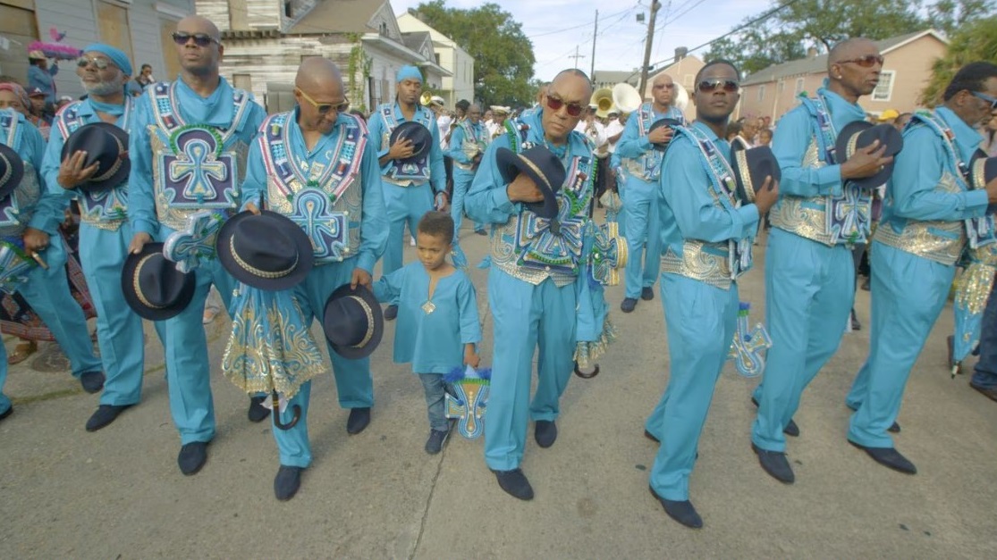 Film still of Black Men of Labor marching and singing "Amazing Grace" during their annual second line parade in a scene from Jason Berry's film "City of a Million Dreams." CITY OF A MILLION DREAMS/SPIRIT TIDE PRODUCTIONS