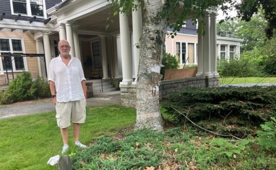 Skip Shea stands outside a building that was once the House of Affirmation, a Whitinsville, Massachusetts, treatment center for pedophile priests. It was run by the Diocese of Worcester. In 1974, when he was 14, he mowed the lawn here and was abused inside the building by clergy. Shea is calling on the Massachusetts attorney general to publish an investigation it started at least two years ago, into clergy sexual abuse of minors that he and others say occurred at the House of Affirmation and in other parts of the diocese. Nancy Eve Cohen / NEPM
