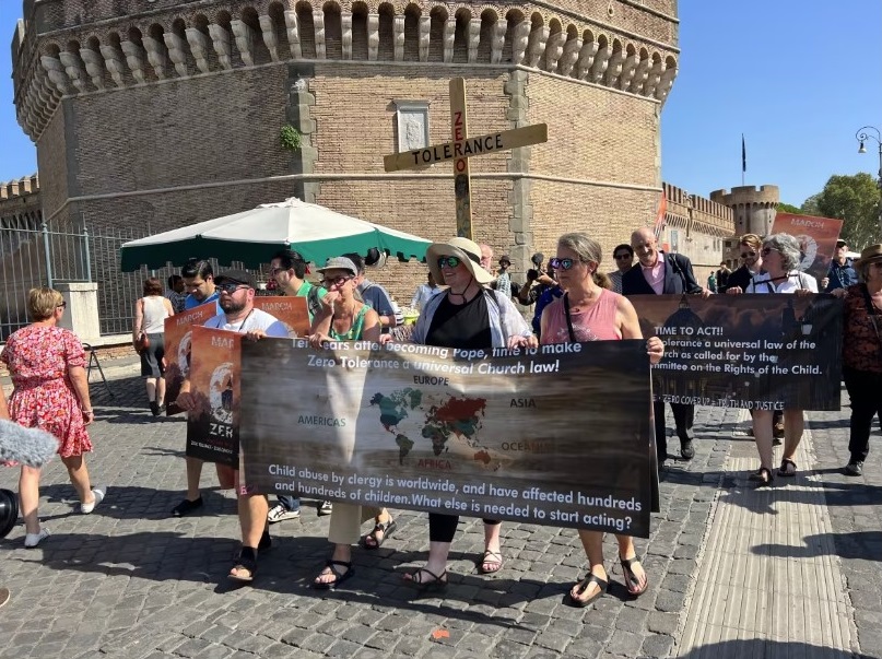 Survivors of clergy sex abuse from Canada and around the world [Ending Clergy Abuse ECA] are shown marching near the Vatican on Wednesday after a five-day pilgrimage to Rome. (Megan Williams/CBC)