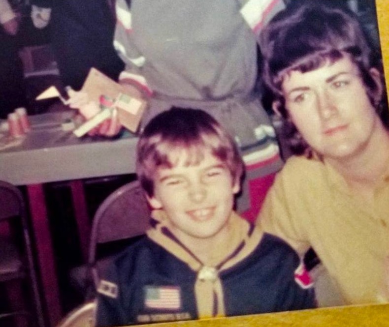 Paul Jan Zdunek at a Boy Scouts awards dinner at Bishop John Neumann School in 1977 with his mother, Carole Hines.