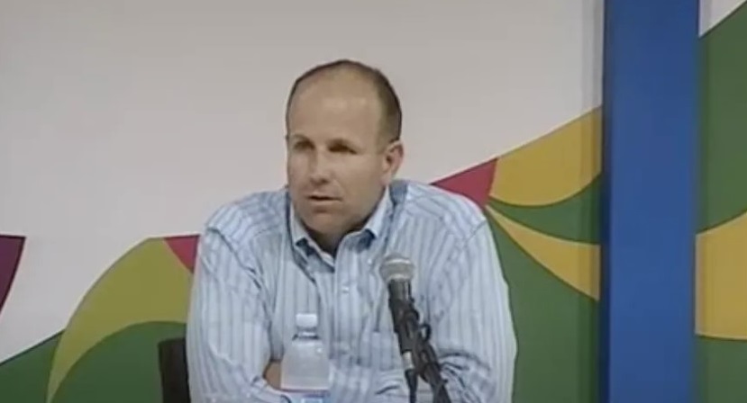Christopher Bacich, former U.S. national leader of the Communion and Liberation movement, speaks at the 2009 Rimini gathering. Credit: Communion and Liberation.