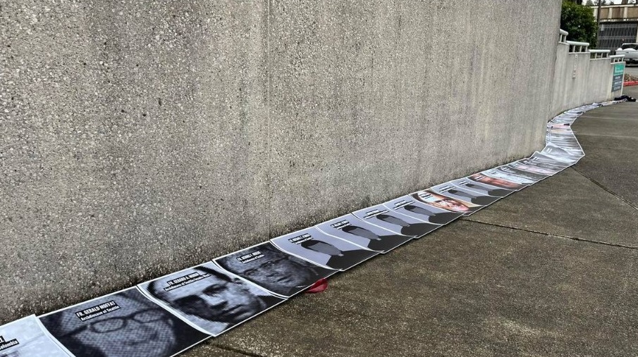 The Catholic Accountability Project lined up pictures outside the WA Attorney General’s Office Tuesday of the 151 clergy members in Washington who are [so far known to be accused] of sexual abuse.
