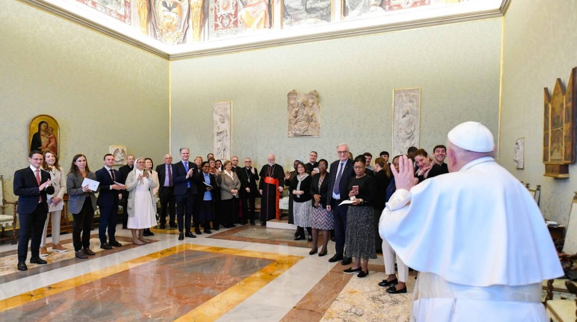 Pope Francis greets members of the Pontifical Commission for the Protection of Minors, in Rome for their plenary assembly, during a meeting at the Vatican March 7, 2024. (CNS photo/Vatican Media)