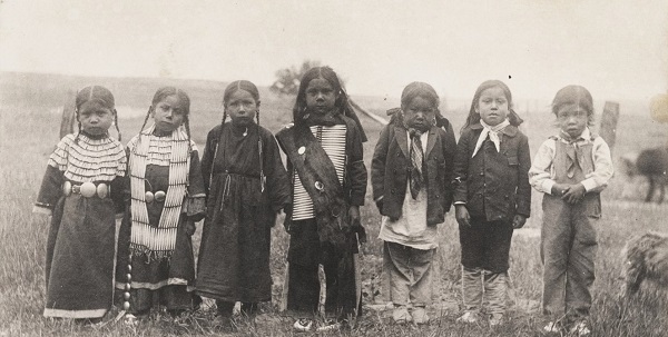Sioux children are seen before entering Hampton Institute in Virginia in 1897. Native American children — some as young as 5 — were forcibly removed from their homes and sent hundreds of miles to Indian boarding schools. (Library of Congress)