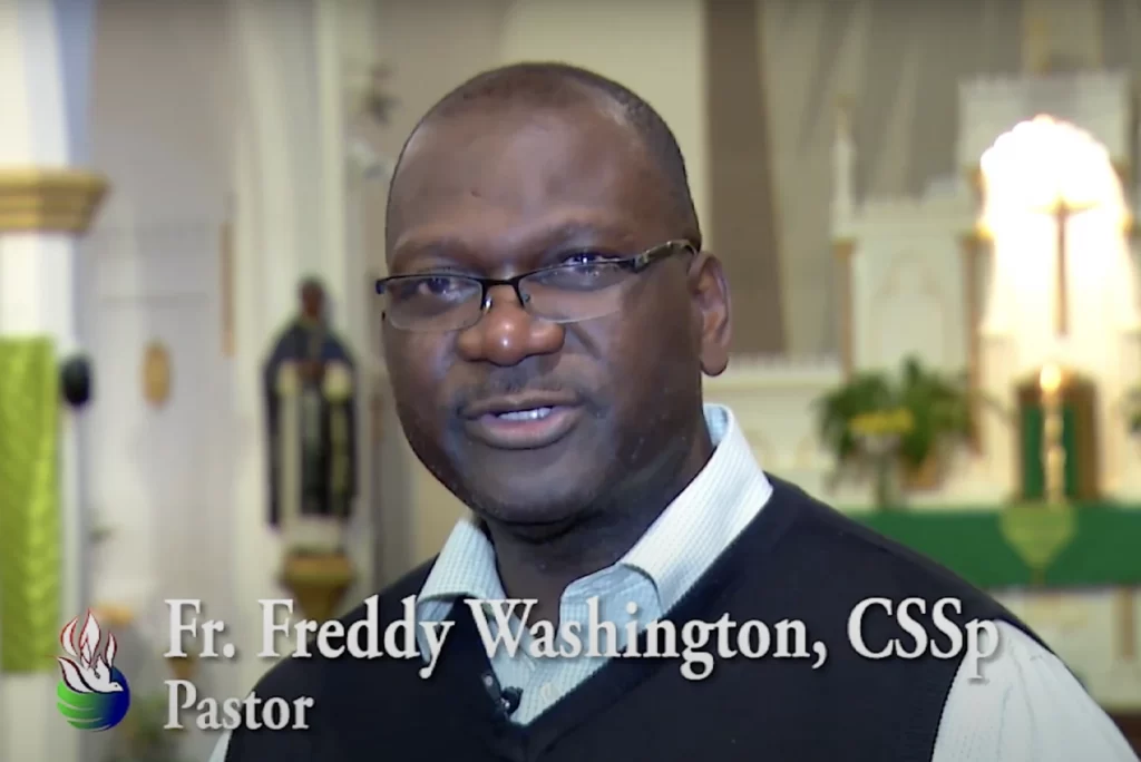 The Rev. Freddy Washington, shown in a promotional video for the Spiritans, before his removal from public ministry. – YouTube