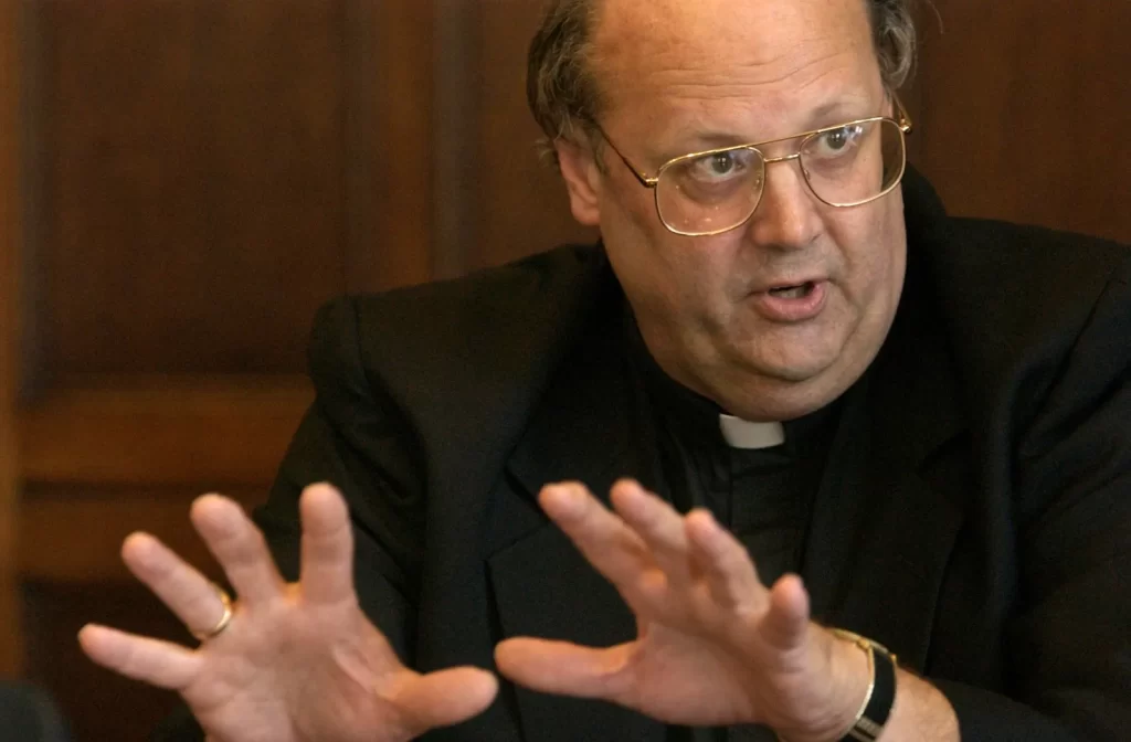 The Rev. David Ryan, then assistant executive director of Maryville Academy, spoke to the media about the alleged trouble at the facility on July 10, 2003. (James Branaman/Chicago Tribune)