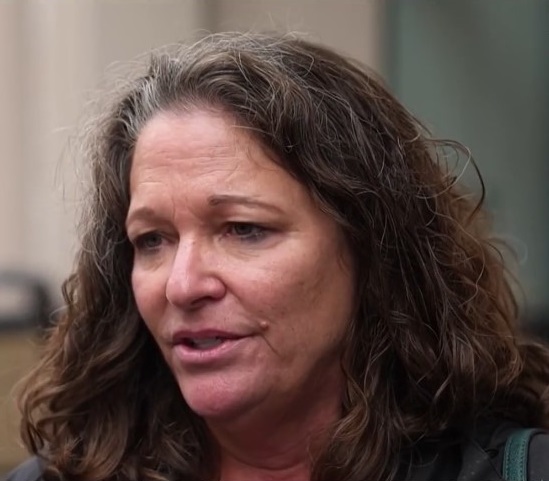 Sherry Waterworth, survivor of childhood sexual abuse by Fr. Stephen Kiesle, speaks to reporter Candice Nguyen after giving her statement in U.S. Bankruptcy Court in Oakland on December 13, 2024.