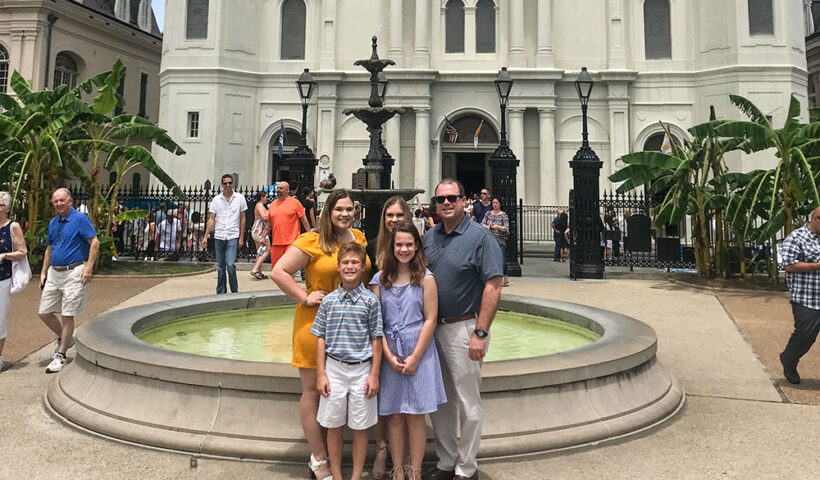 James Adams and his children pose for a photo outside St. Louis Cathedral in New Orleans after Sunday Mass in April 2019. (Courtesy of James Adams