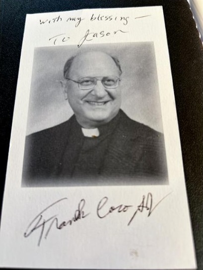 A picture of Jesuit Fr. Frank Coco is seen on a card signed to writer Jason Berry, marking Coco's 50th anniversary as a priest in 2001. (Courtesy of Jason Berry)